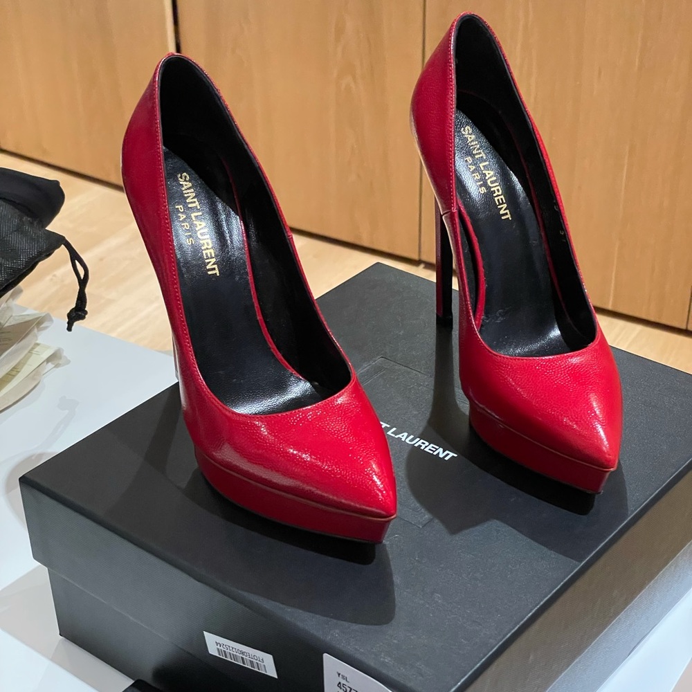 Saint Laurent red platform pumps in size 7.5.